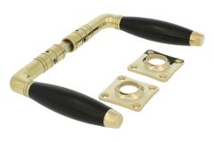 Deurklink (1931) ongelakt messing ebbenhout stel